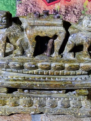 Antique carved stone decoration of Asian temple used