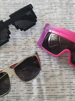 Three pairs of sunglasses like new