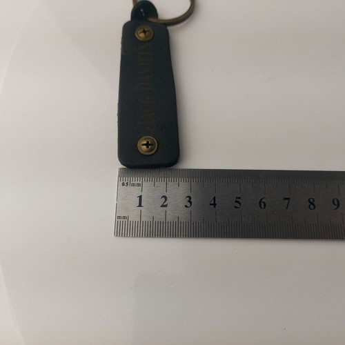 Jack Daniel's Whiskey collector keychain black leather used