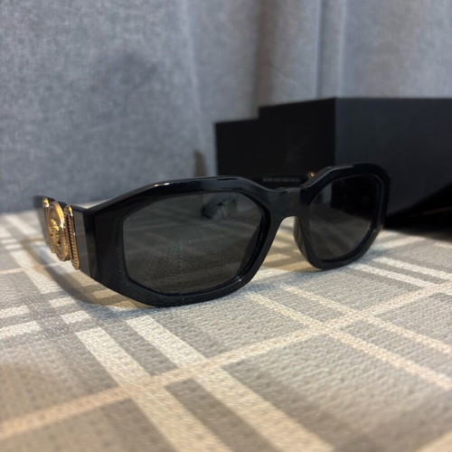 Versace sunglasses for women like new, black and gold