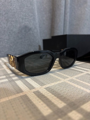 Versace sunglasses for women like new, black and gold