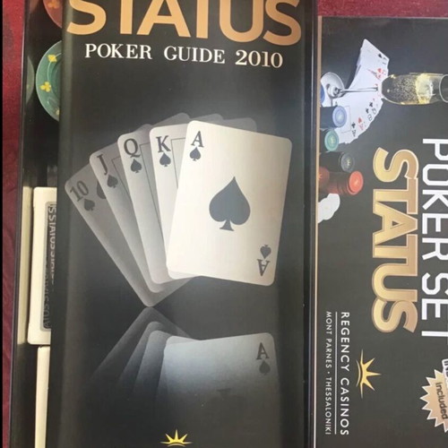Poker set new in metal case with chips and cards