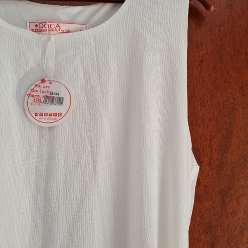 Doca dress new, white, fits small and medium sizes