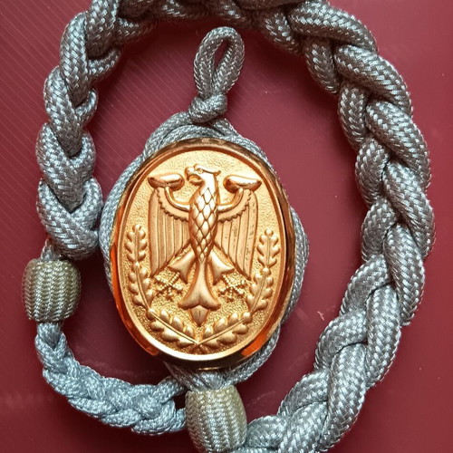 Collectible German uniform shoulder cord badge like new