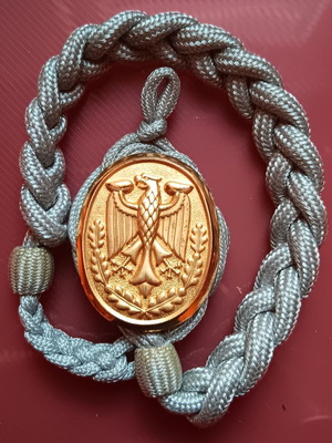 Collectible German uniform shoulder cord badge like new