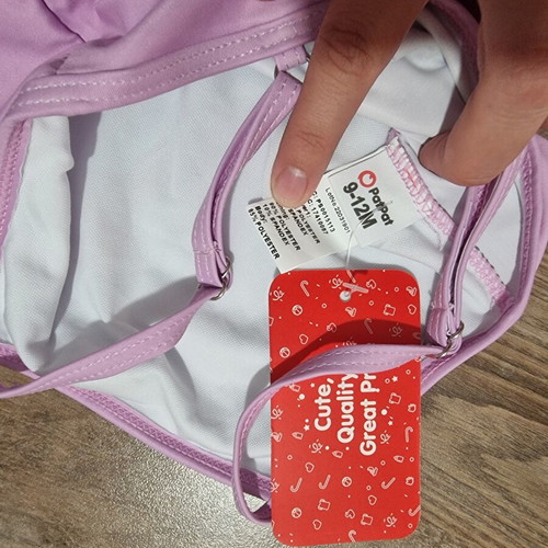 Children's swimsuit new, size about 6-9 months