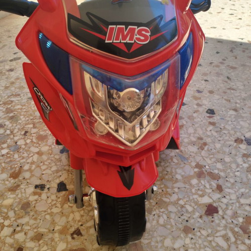 Battery-powered children's motorcycle used, needs battery replacement