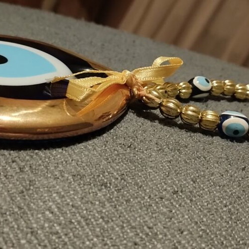 Handmade glass wall eye Candymosa 3.5 inches with gold wreath, like new