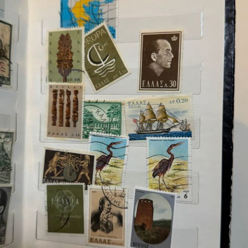International Stamp Collection album with large vintage Greek and foreign stamps lot
