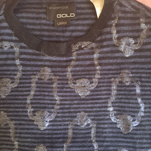 Energy shirt like new, blue with embossed designs