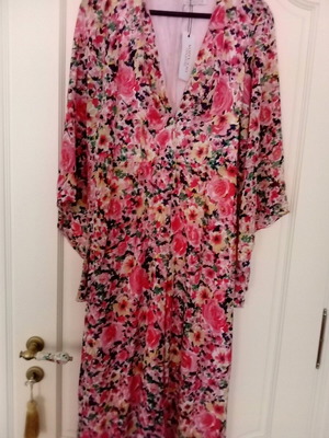 Women's jumpsuit new, size small, multicolor