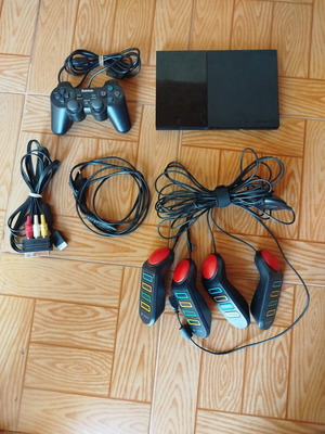 PlayStation 2 with buzzer used, complete cables