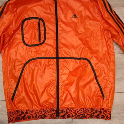 Adidas windbreaker orange size Medium like new