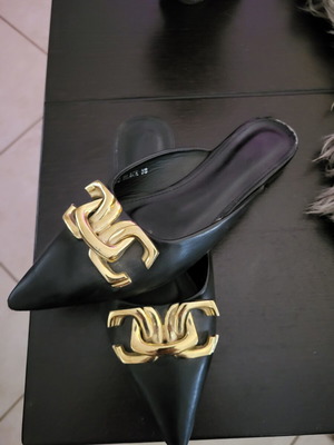 Flat mules used, size 37, black and gold