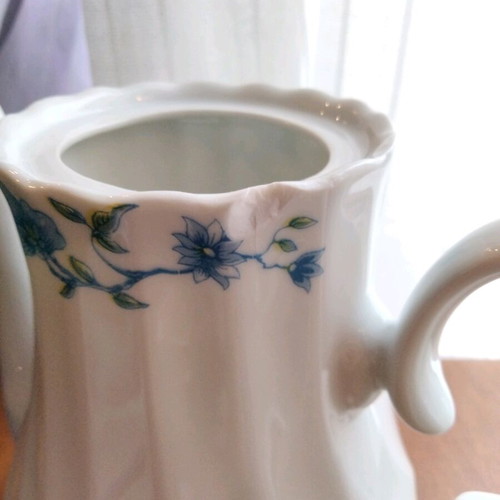 Vintage tea and coffee set in white porcelain like new