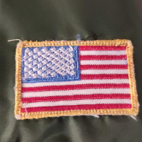 Flight jacket with embroidered patches like new, size 12
