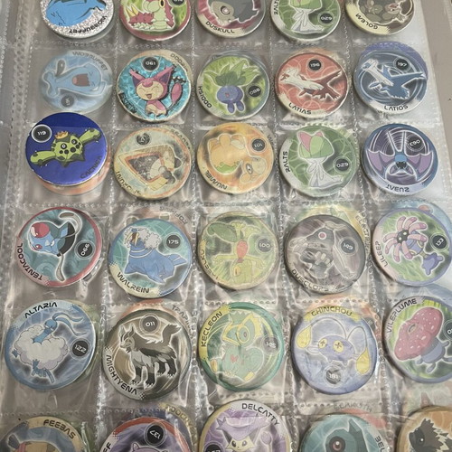 Pokemon tazos with album collection
