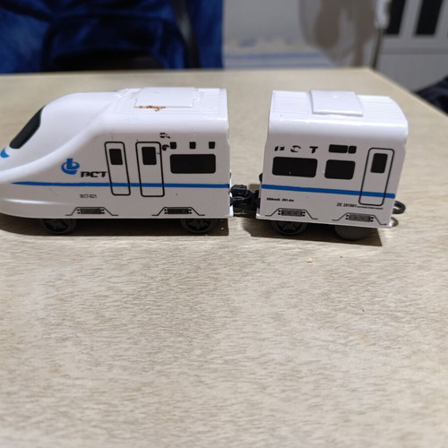 Plastic helicopter and train figures used