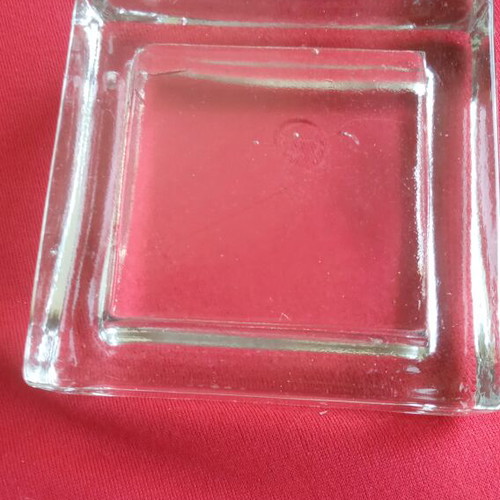 Kosta Boda vintage square crystal bowl with face design by Bertil Vallien