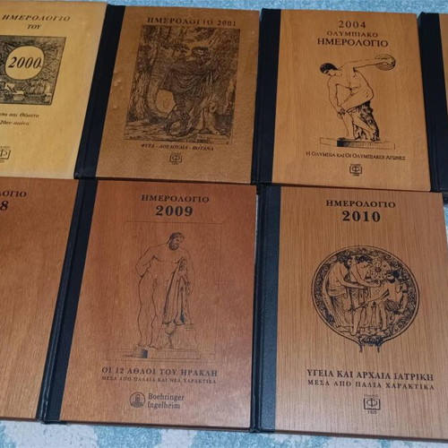 Collectible calendars like new with wooden cover