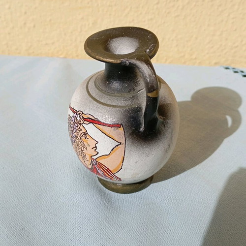 Small amphora new, black color with design and one handle