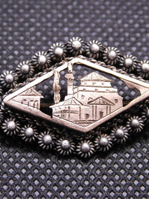 Silver-gold Rhodian style brooch with castle motif