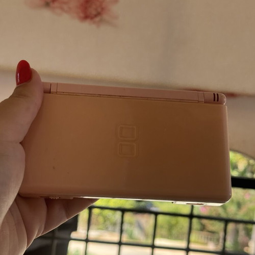 Nintendo DS used with 5 game cartridges and charger