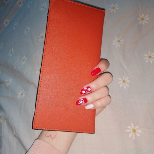 Orange wallet with six card slots and two bill compartments