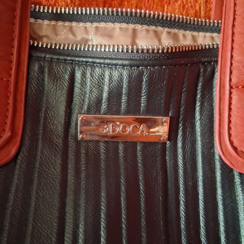 Doca shoulder bag like new with fabric strap, blue and red
