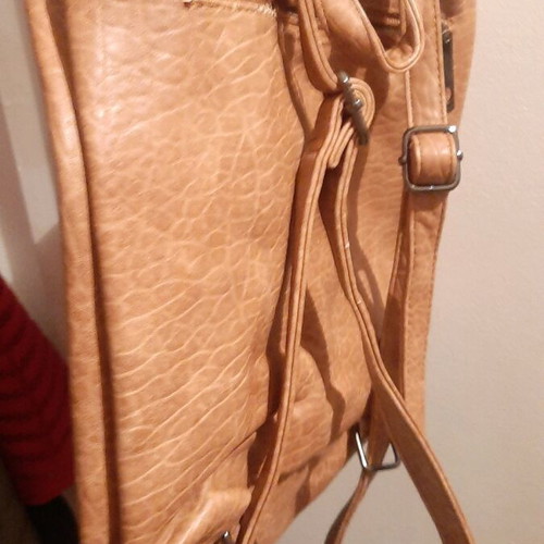 Backpack used with minor scratch on side