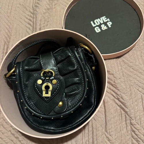 Juicy Couture bag cross body like new, black leather with charms