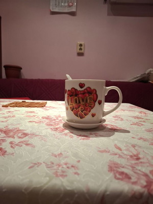 Porcelain tea cup with spoon and Love inscription new