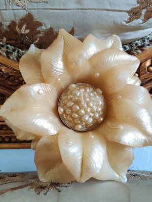 Decorative flower-shaped candle like new