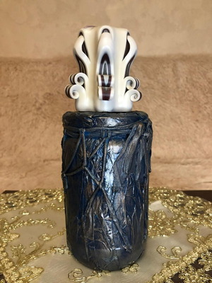 Decorative candlestick with carved candle handmade new