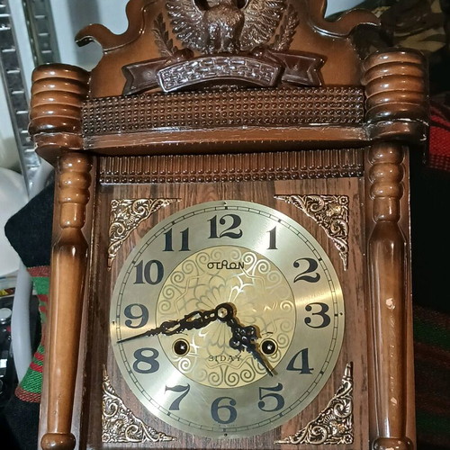 Vintage wooden wall clock with pendulum used, eagle decoration