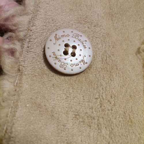 Mouton coat like new for 2-year-old with fur lining
