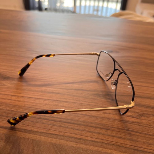 Sandro eyeglass frame new, black metal with gold arms
