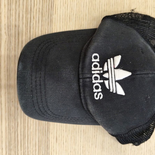 Adidas Originals black trucker cap with white trefoil logo