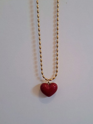 Long necklace with gold-tone chain and red heart pendant like new