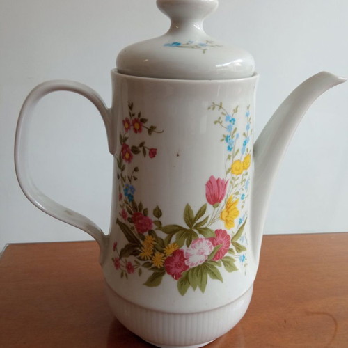 Vintage porcelain jug with floral design used, made in GDR