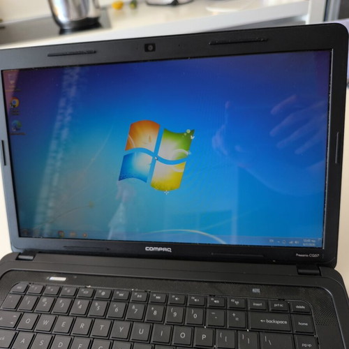 HP Compaq Presario CQ57 laptop used, 15.6" HD, AMD E-450, 4GB RAM, 320GB HDD
