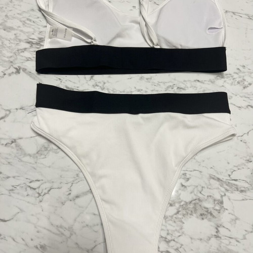 Swimsuit set like new, black and white, size M/L