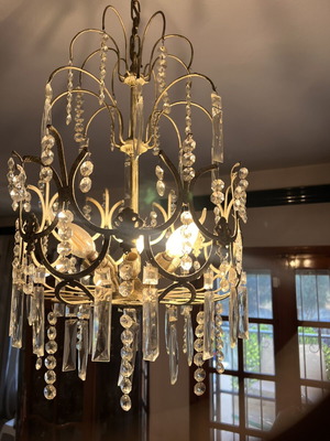 Bulgari crystal ceiling lights used with gold patina, two six-light and one single-light