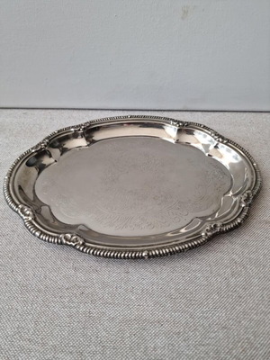 Vintage silver-plated serving tray with engraved decoration