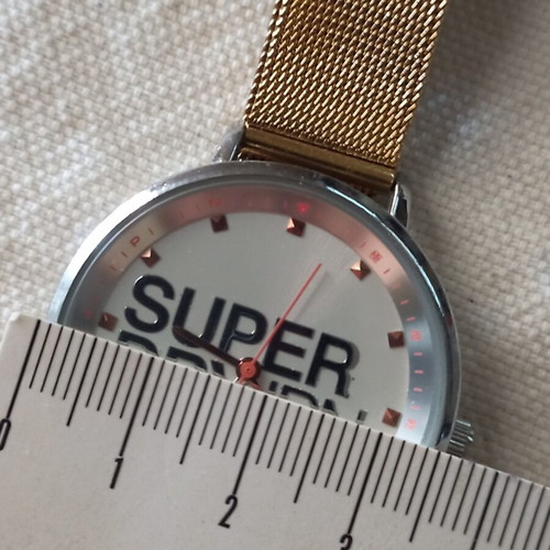 Superdry watch metal bracelet like new, gold color