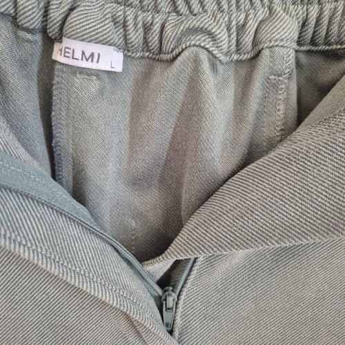 Helmi trouser size L loose fit baggy pistachio color button missing
