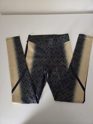 Smart sports leggings used, black with yellow design, size S