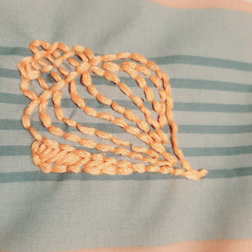 Decorative pillow with golden hand embroidery and sea motifs, new