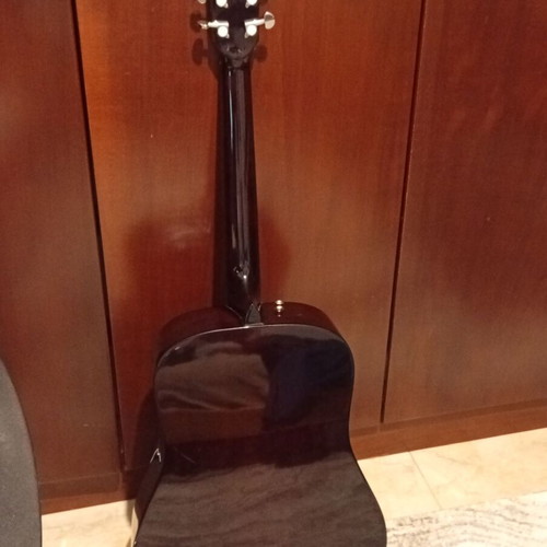 Fender acoustic guitar used with Ernie Ball strap