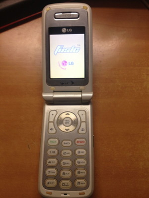 LG Sprint Fusic LX550 used, white and black